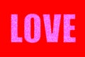 Word `love` - Ã¢â¬â¹Ã¢â¬â¹isolate on red background. Letters of purple chrysanthemum flowers. Concept.